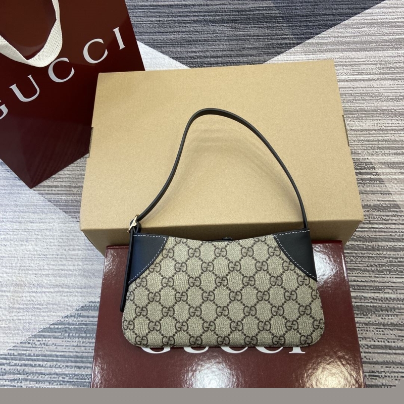 G*u*i top handle bags
